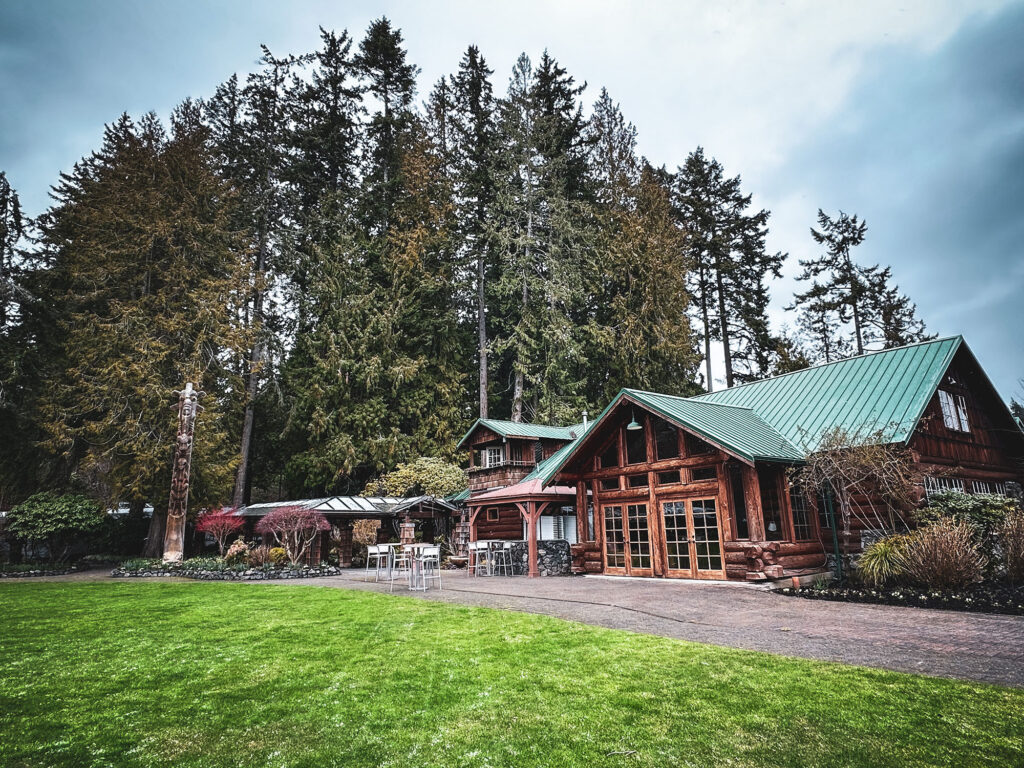 Kiana Lodge in winter under green fir trees