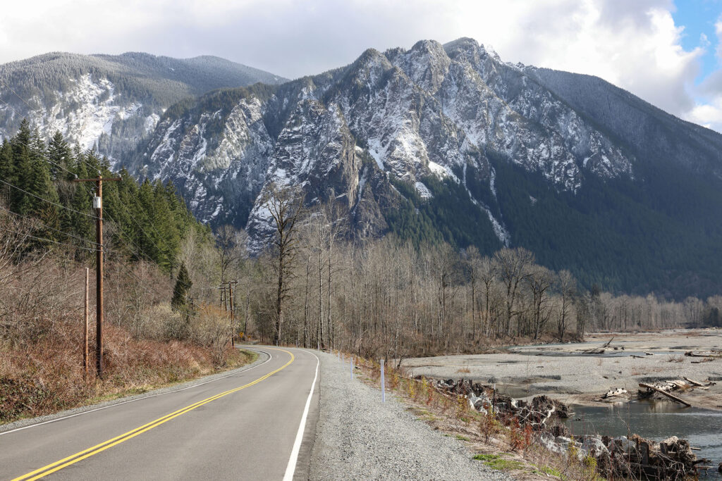 Reinig Road with snow-covered Mount Si in the distance.