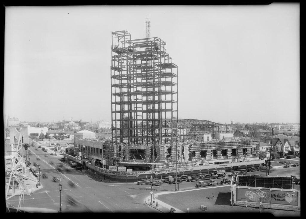 Black and white photo of a building being constructed