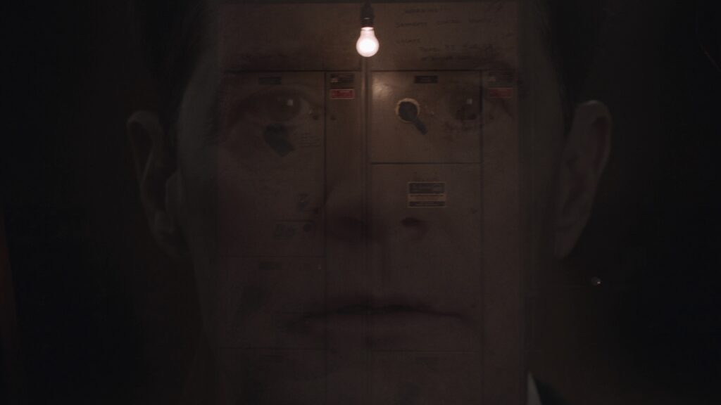 Cooper's face superimposed over boiler room controls