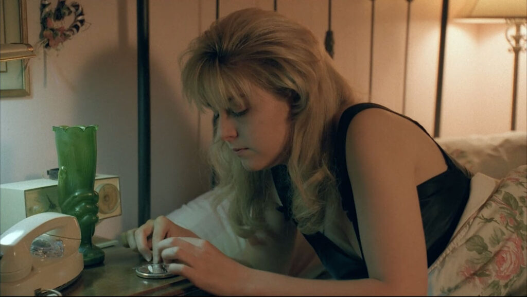 Laura Palmer doing drugs in her bed.