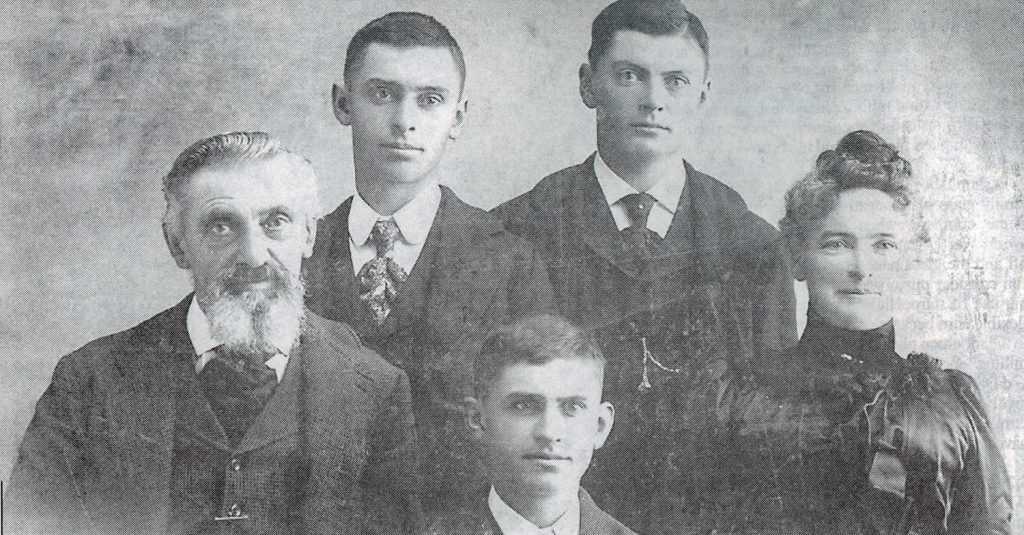 Black and white photo of the Reinig family - Leonard and Margaretha with their sons Otto, Dio and Eddie