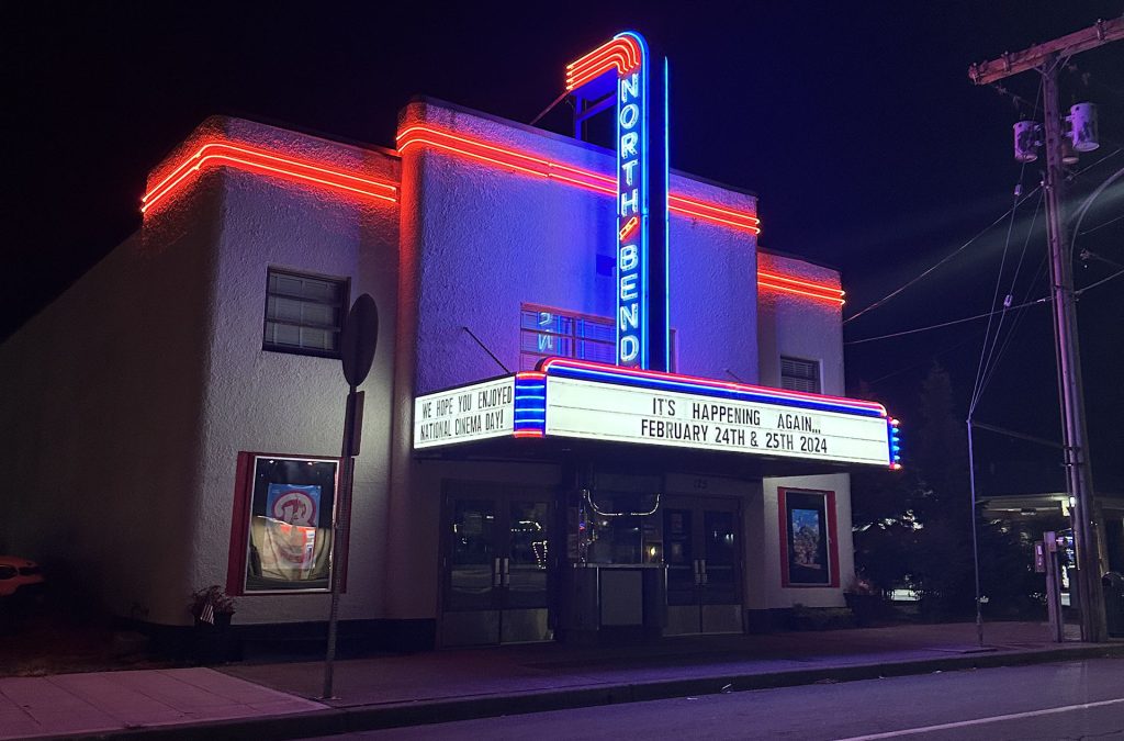 North Bend Theatre at night illuminated by neon