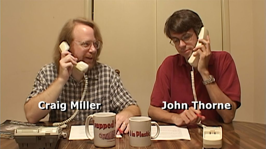 Two people speaking on phones