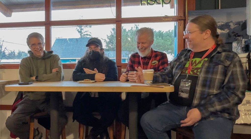 Four people at a table