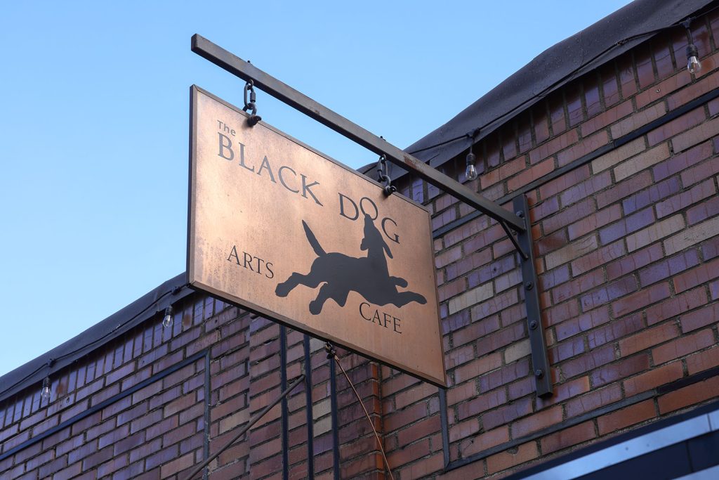 Black Dog Arts Cafe sign