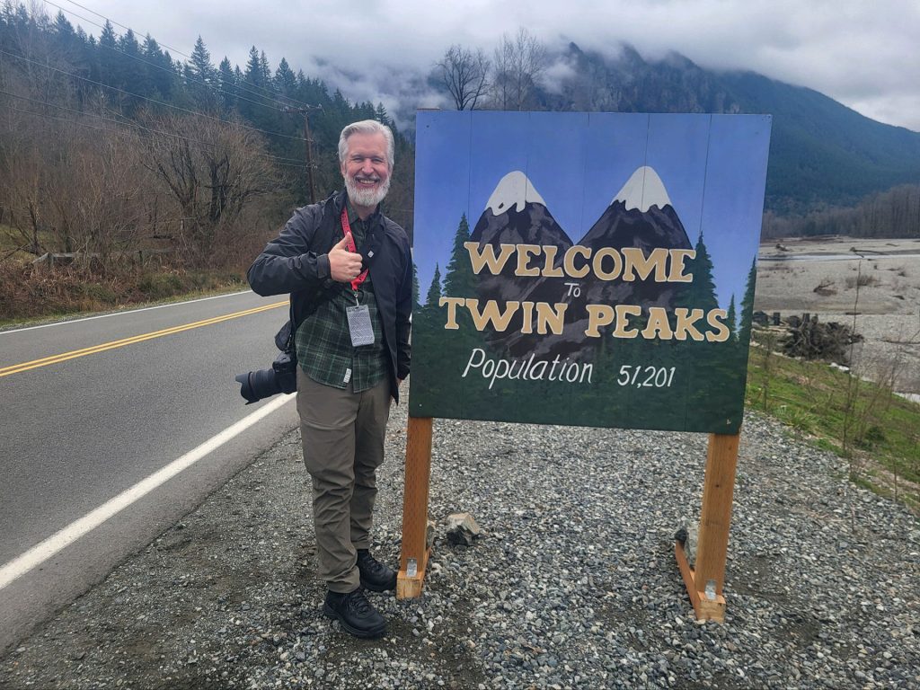 Steven with Welcome to Twin Peaks Sign