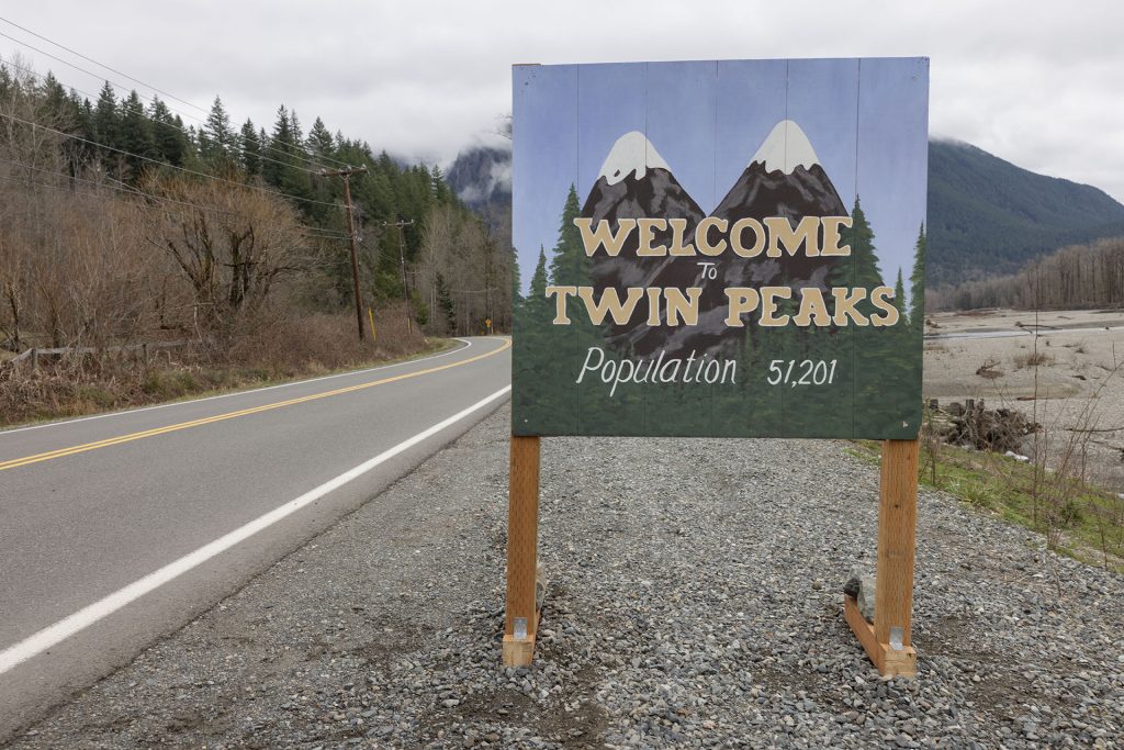 Welcome to Twin Peaks Sign on side of road