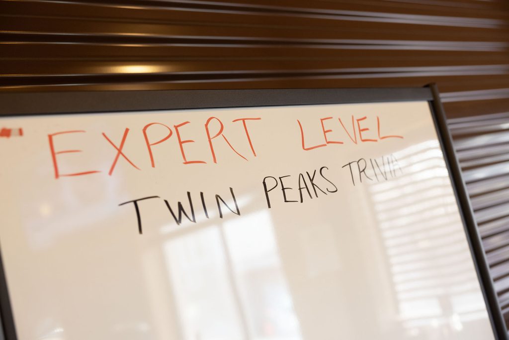 Expert Level Trivia title on a dry erase board