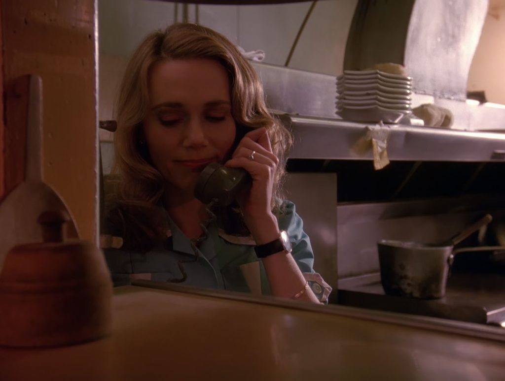 Norma Jennings in the kitchen on the phone