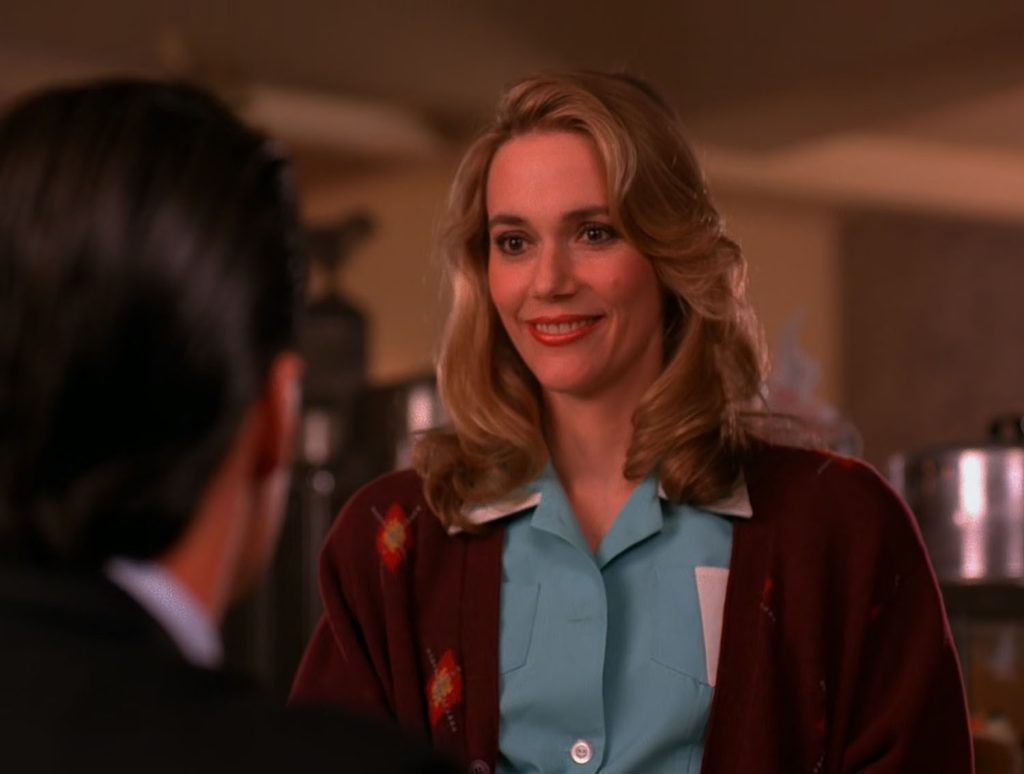 Norma Jennings speaking with Agent Cooper at the Double R Diner