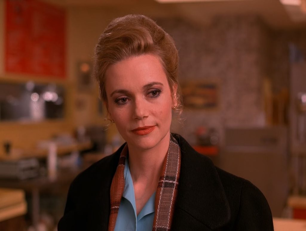 Norma Jennings in the Double R Diner wearing her hair up