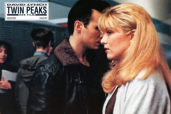 Twin Peaks: Fire Walk With Me Lobby Card from Germany featuring James Hurley walking by Laura Palmer in high school.