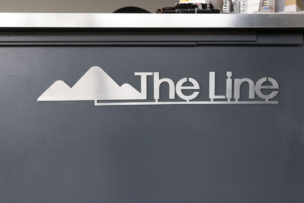 The Line Logo on a desk