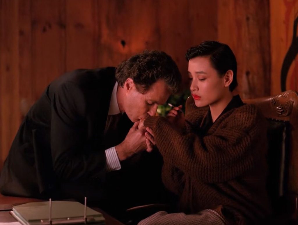 Ben Horne kissing Josie Packard's hand