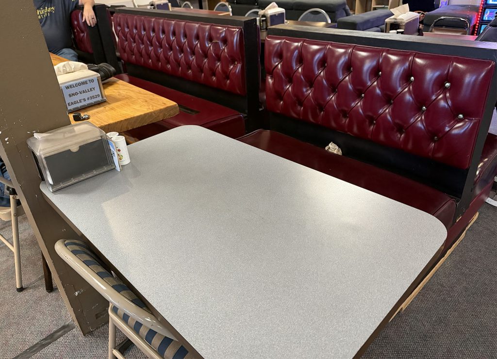 Booth and table inside Sno-Valley Eagles