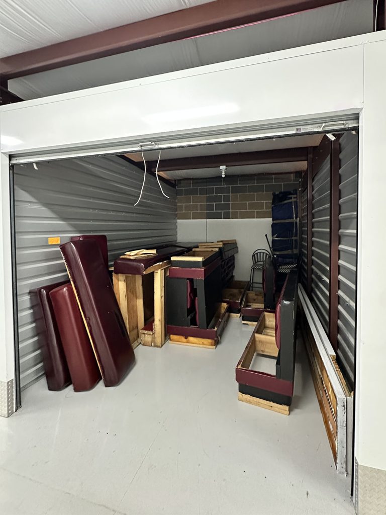 Storage unit with booth and counter