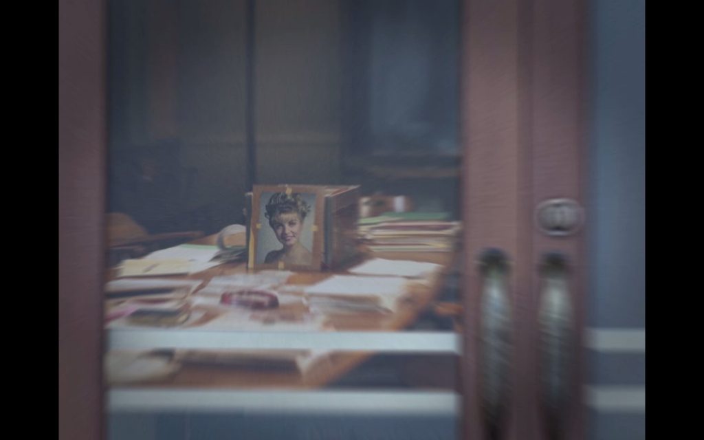 Glass door looking at Evidence table