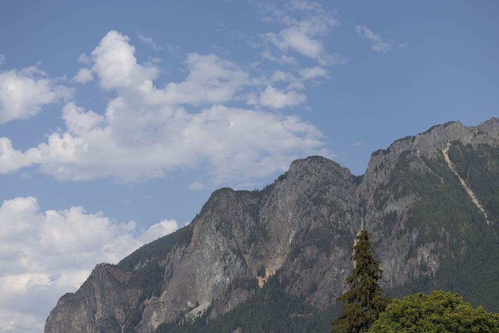 Mount Si against blue skies with white clouds