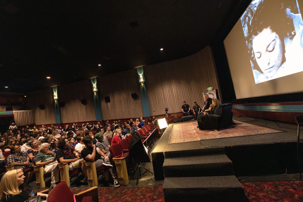 Sheryl Lee on stage in front of a theatre audience