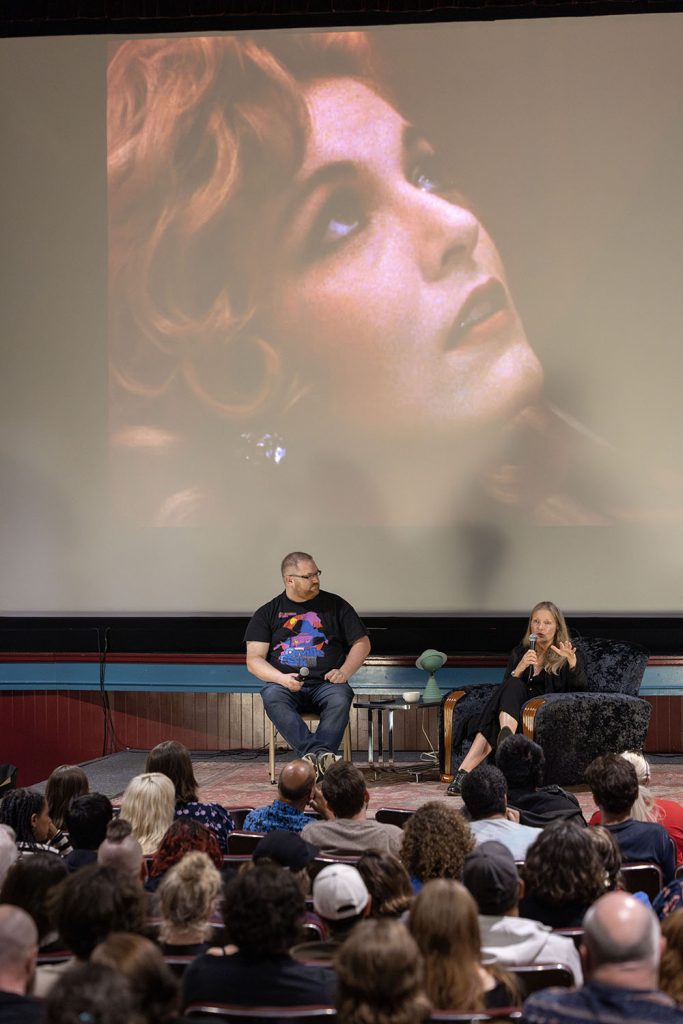 Sheryl Lee on stage in front of a theatre audience