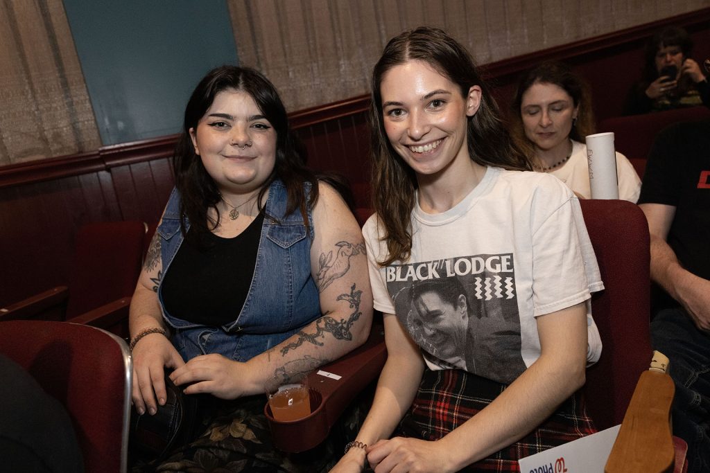 Two people in a movie theatre