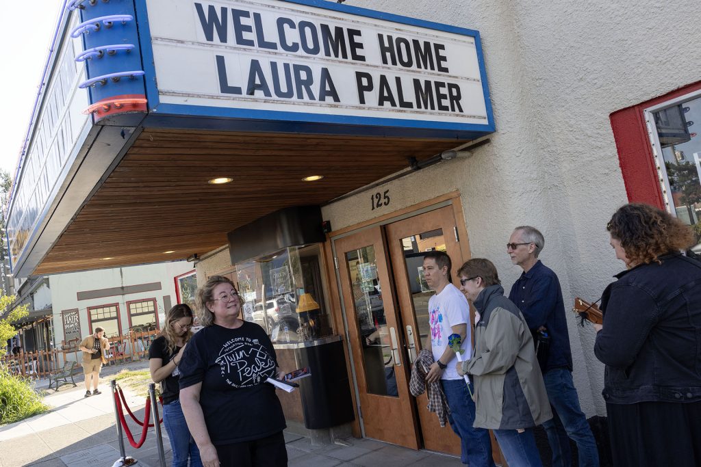 Beth Burrows welcoming guests to the North Bend Theatre