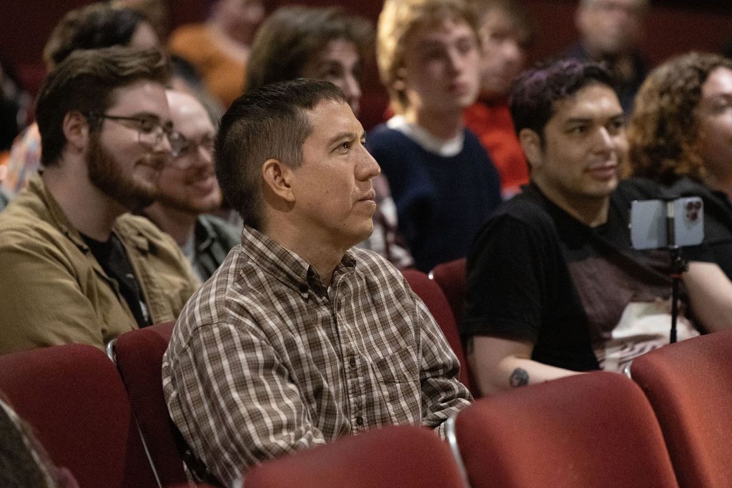 Jeff Powell in theatre seat