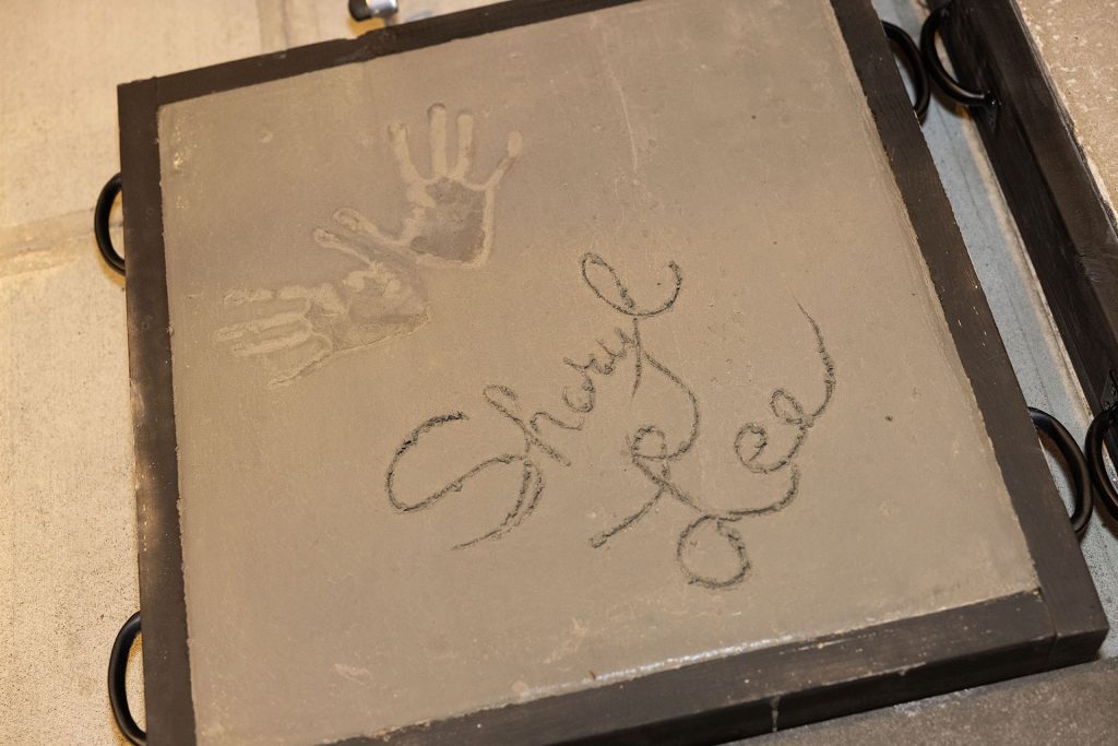 Sheryl Lee's handprint and signature in cement