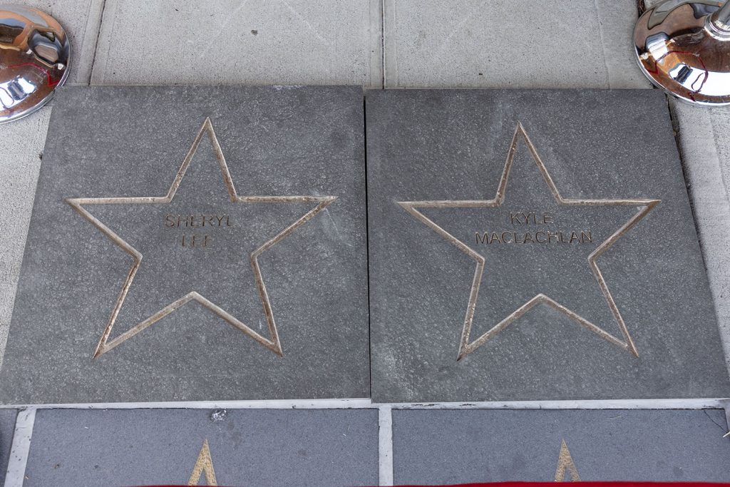 Two stars in cement