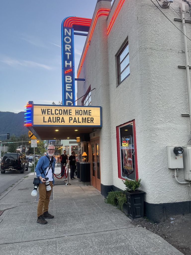 Steven standing in front of North Bend Theatre with camera gear