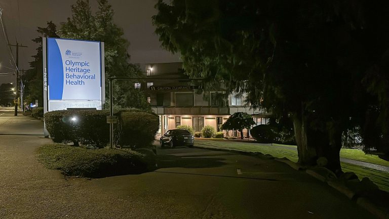 street sign outside a hospital building