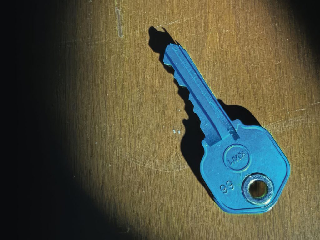 Blue Key on a table