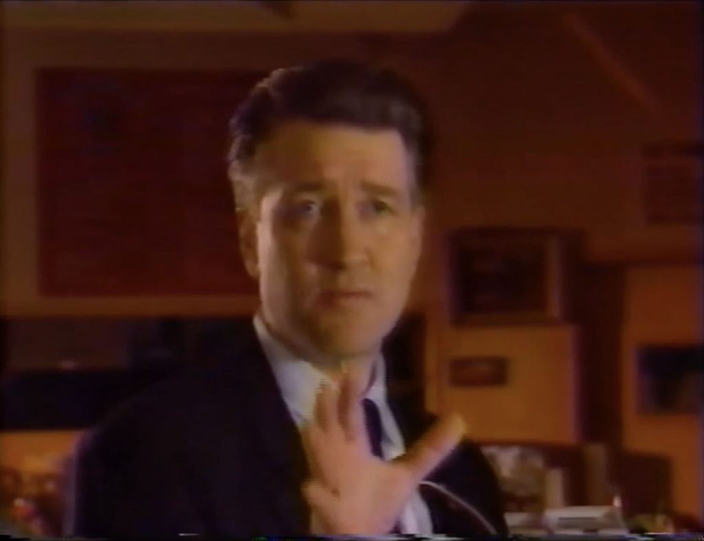 David Lynch dressed as Gordon Cole on the Double R Diner Set