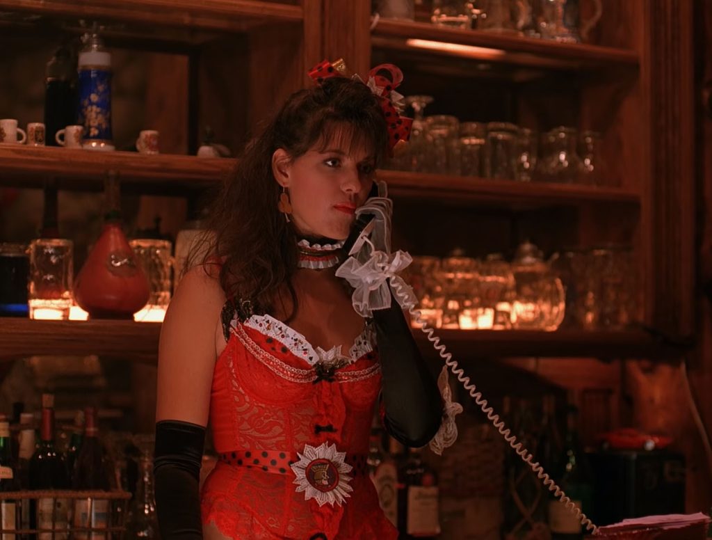 Bartender at One-Eyed Jack's answering a phone