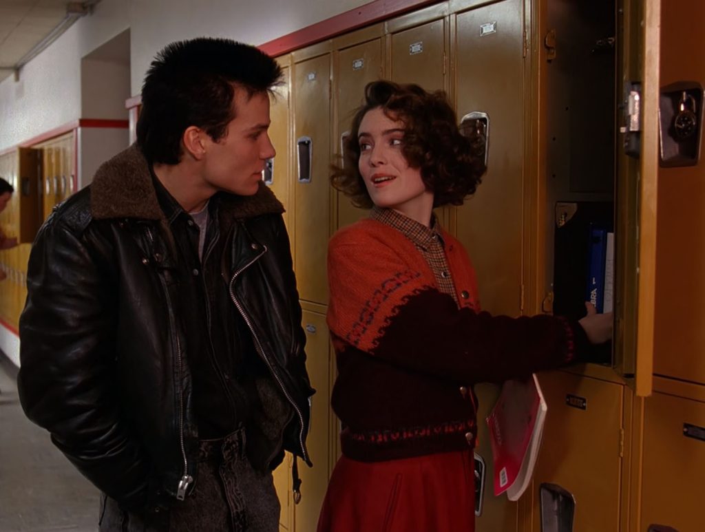 Donna Hayward speaking with James Hurley at School lockers