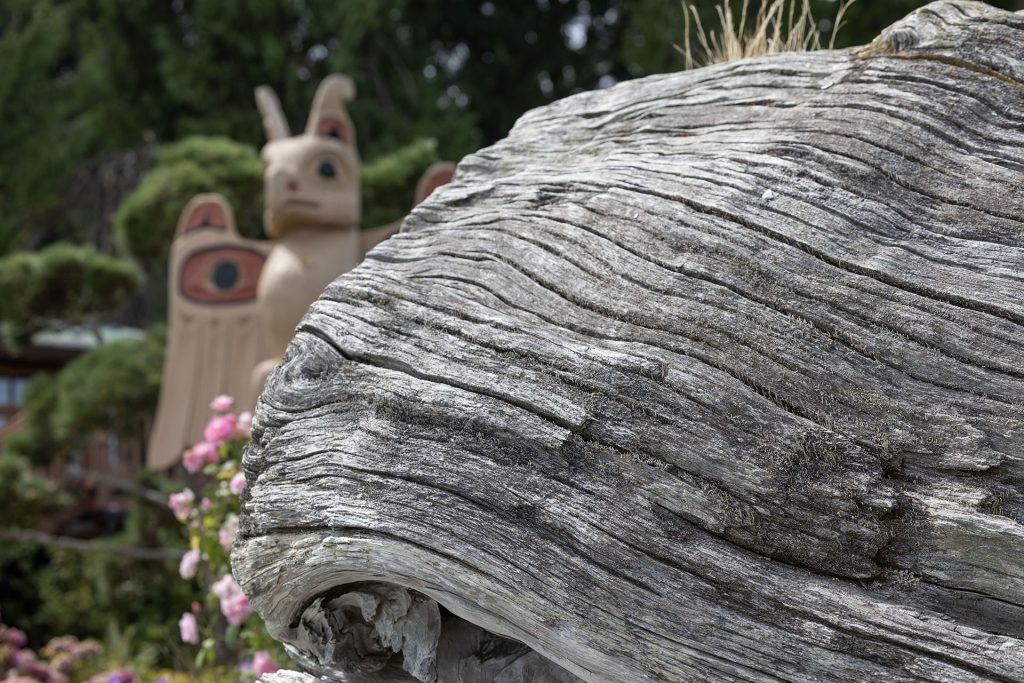 Close up detail of Laura Palmer's log with Thunderbird Totem pole in backgound