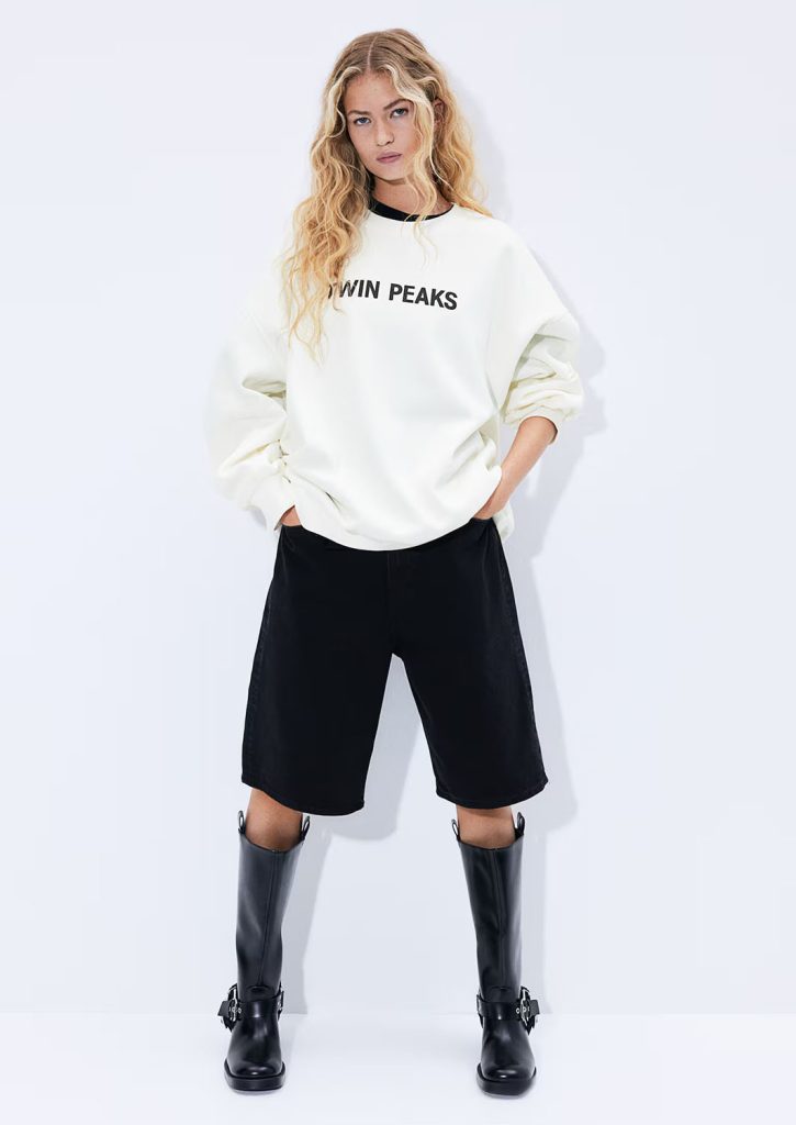 Blonde model wearing Twin Peaks sweatshirt