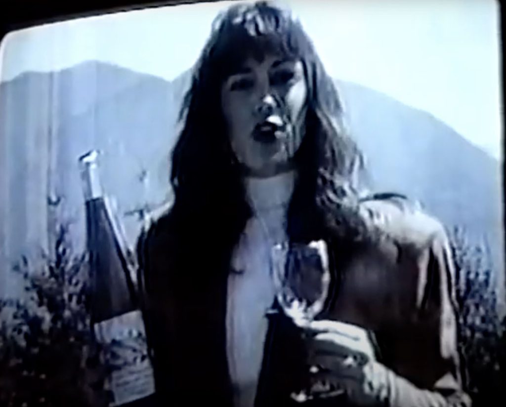 Claudia Cottle with Twin Peaks Mountain Spring water and glass