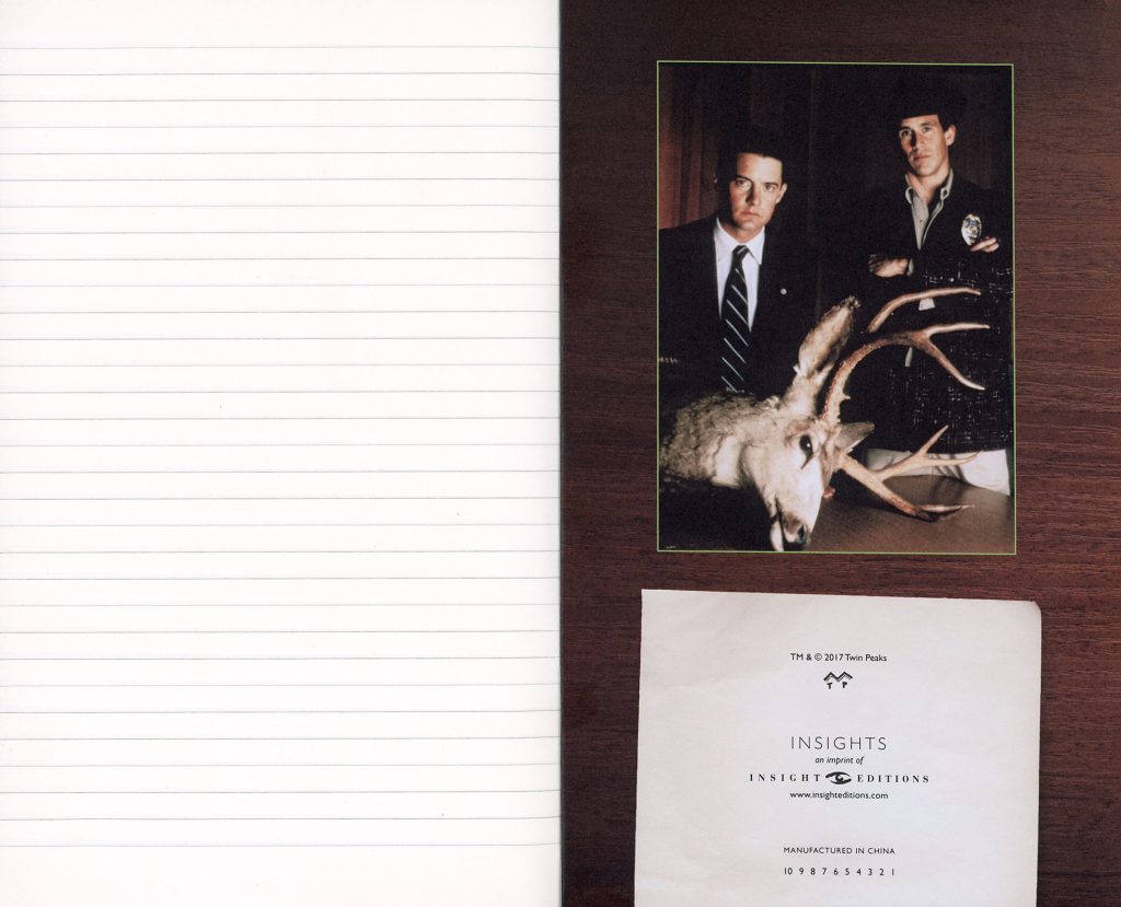 Photo of Agent Cooper and Sheriff Truman and a blank page