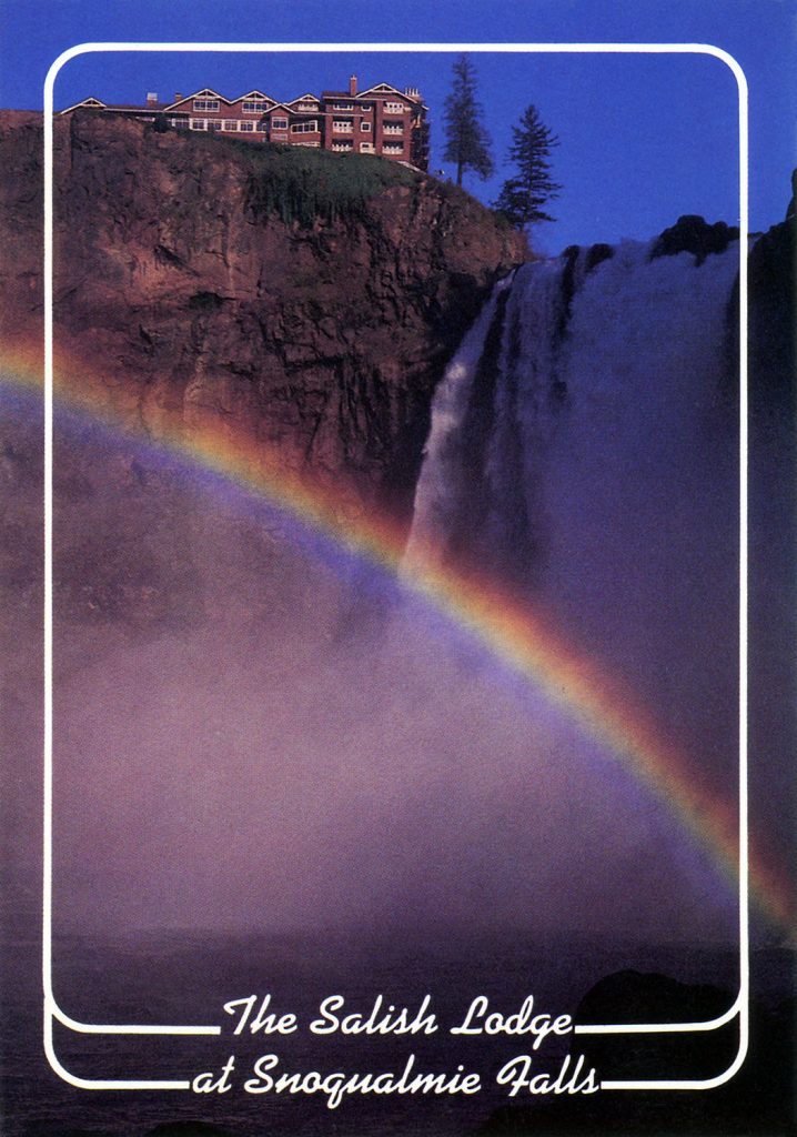 Photo of The Salish Lodge above Snoqualmie Falls with a rainbow