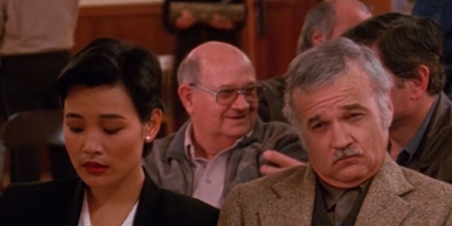 Guy seated behind Josie Packard in the Twin Peaks Pilot