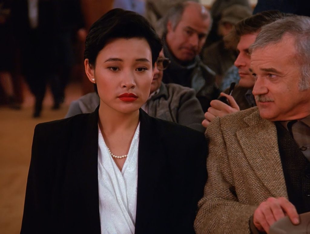 Guy seated behind Josie Packard in the Twin Peaks Pilot