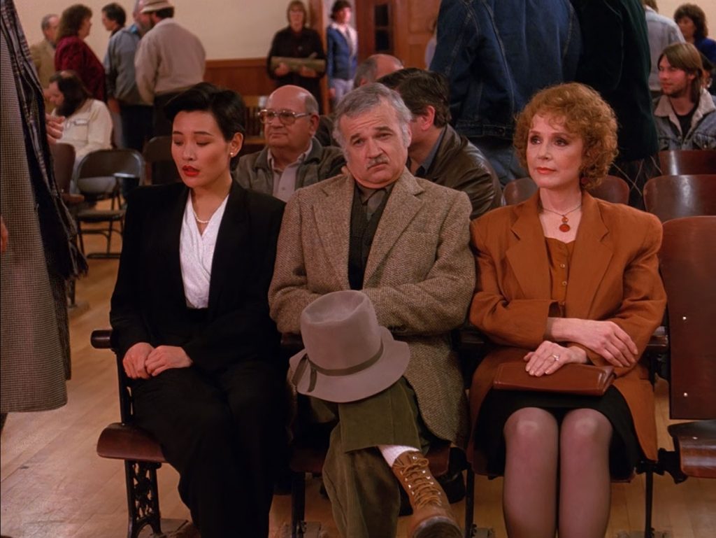 Guy seated behind Josie Packard in the Twin Peaks Pilot