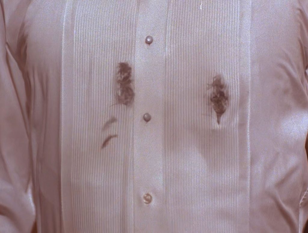 Cooper's bullet hole shirt