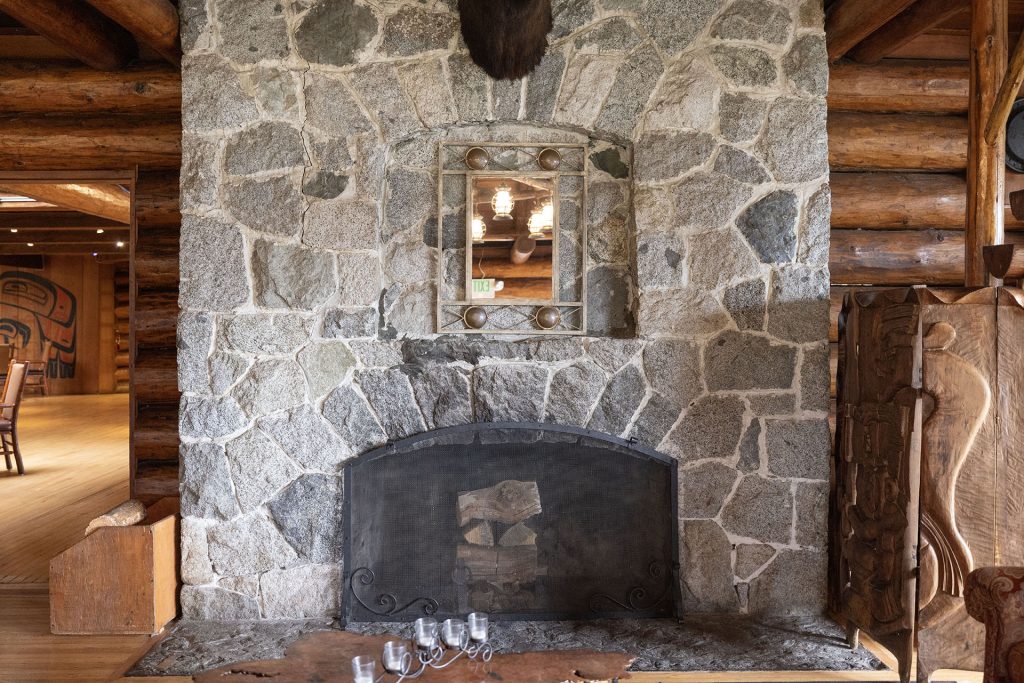 Stone fireplace at Kiana Lodge