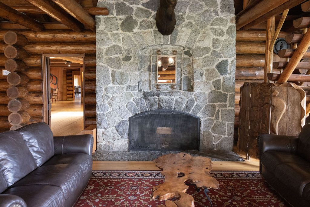 Stone fireplace at Kiana Lodge