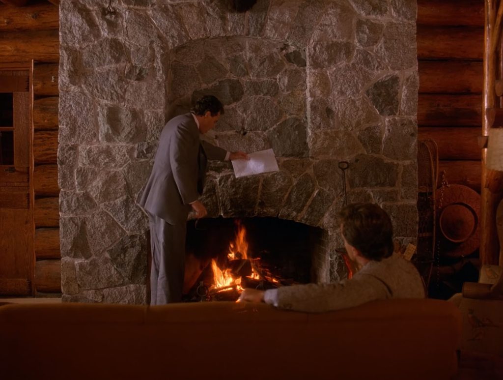 Ben Horne (Richard Beymer) and Leland Plamer (Ray Wise) by a fireplace