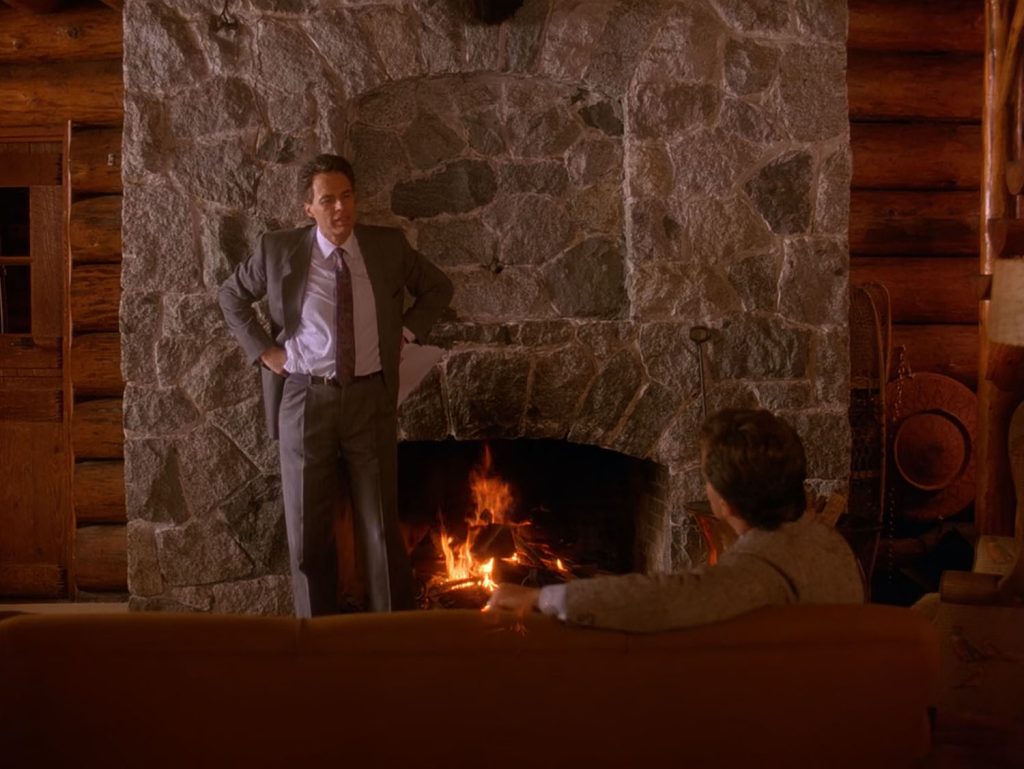 Ben Horne speaking with Leland Palmer by the fireplace