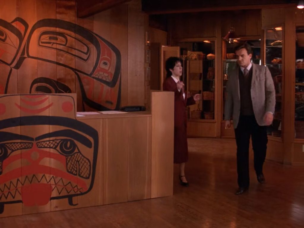 Leland Palmer crossing the Great Northern Hotel Lobby